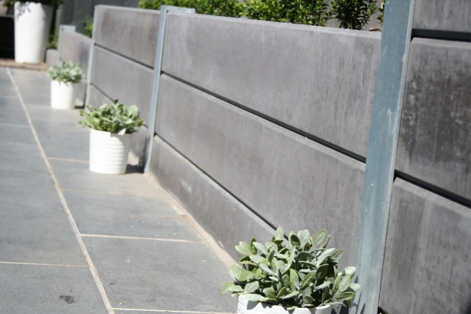 Close-up of a concrete sleeper retaining wall build